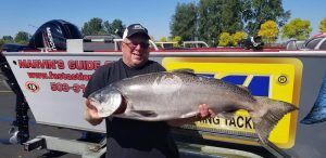 Guide Marvin Henkel with a larger Columbia River Salmon.