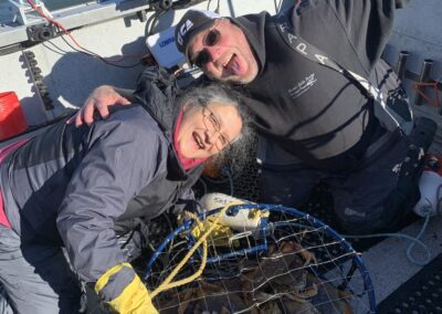 clients with a pot full of crab.