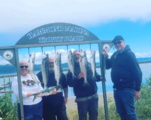 Anglers with eight salmon they caught on the Pacific Ocean west of Astoria on July 22, 2023.